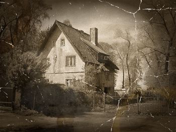 Black and white photo of an old house